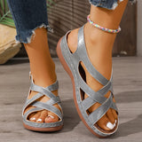 Sandales femme cuir à brides croisées ajourées et bride arrière ajustable — sandales plates élégantes artisanales, style minimaliste méditerranéen, été 2026